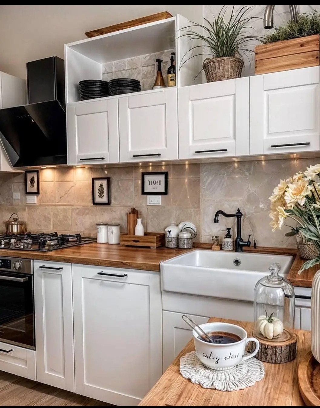 Charming kitchen with white cabinetry