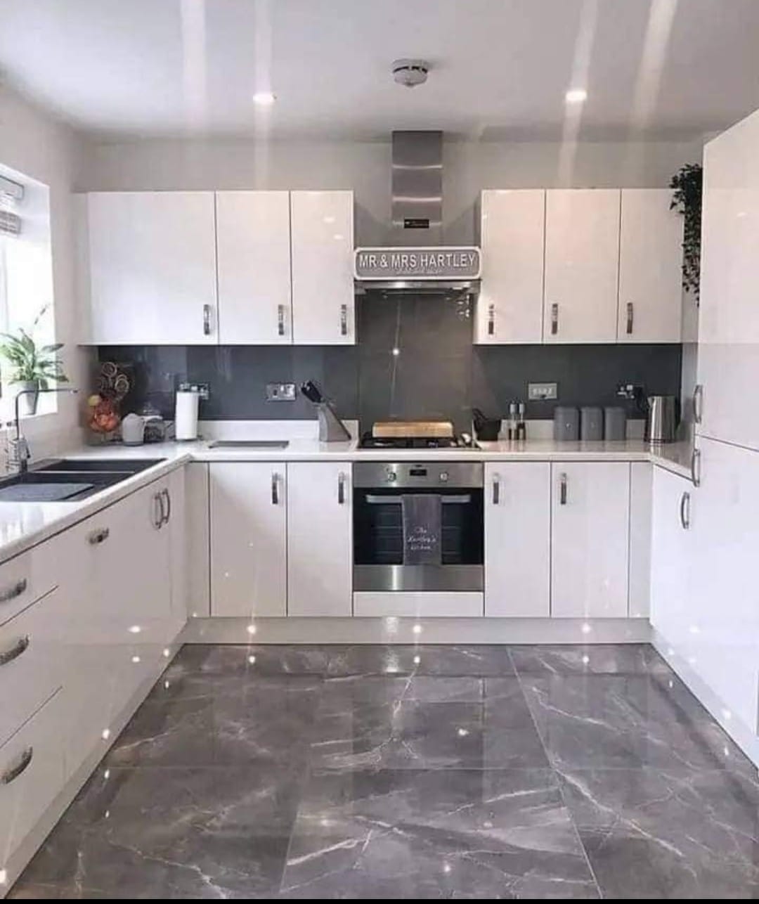 Stylish kitchen with glass-front cabinets