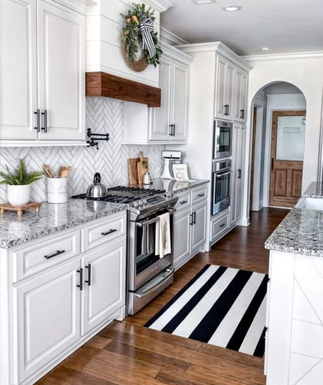 Stylish kitchen with white cabinetry